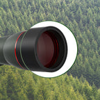 Objectif de la Korons Longue-Vue sur fond forestier